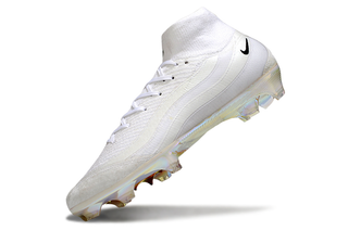 Close-up of Nike Mercurial Superfly X Elite and Air Max 95 SE soccer cleats