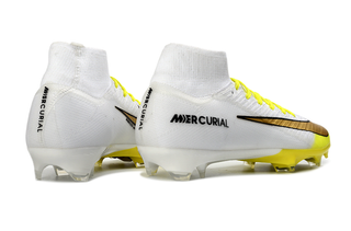 Detailed view of Nike Air Zoom Mercurial Superfly X Elite FG soccer cleats in Golden Strike colorway.